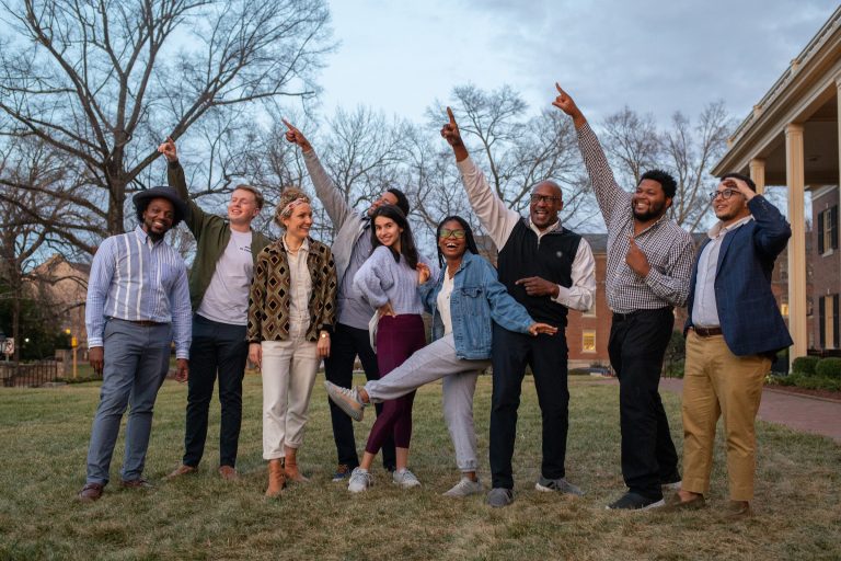 Bernard Bell and the Shuford innovators hang outside with a group of students.