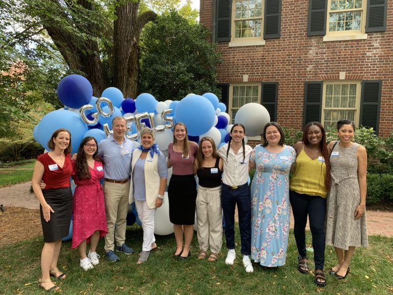 Doug Mackenzie and Dean Terry Rhodes (third and fourth from left) spent time with students at a fellowship gathering in fall 2020.