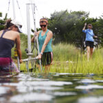 Graduate students perform research on local living shorelines through the UNC Institute of Marine Sciences. (photo by Mary Lide Parker)