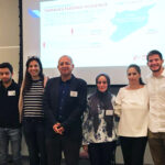 In October 2018, Cemil Aydin (fourth from left) spoke at the Syria in Transition event held by Carolina Public Humanities and the Carolina Center for the Study of the Middle East and Islamic Studies. Aydin was joined by Hiba Alzouby Pharm.D. ’21 (fourth from right) and Kamel Alachraf (second from right) as well as several Syrian refugees for a panel discussion about the global significance of the Syrian war and refugee migration.