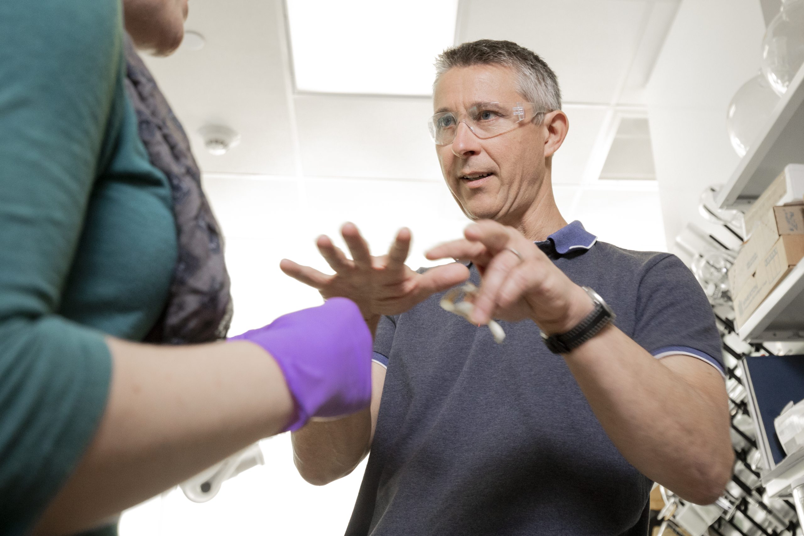 Theo Dingemans, principal investigator for the Sustainable Access to Clean Water Creativity Hub, works alongside Anna Fraser, a PhD candidate in the chemistry department on November 6, 2019 on the campus of the University of North Carolina-Chapel Hill. The project aims to use the convergent science approach to bring different groups across campus together to tackle large, global issues (Photo By Jeyhoun Allebaugh).