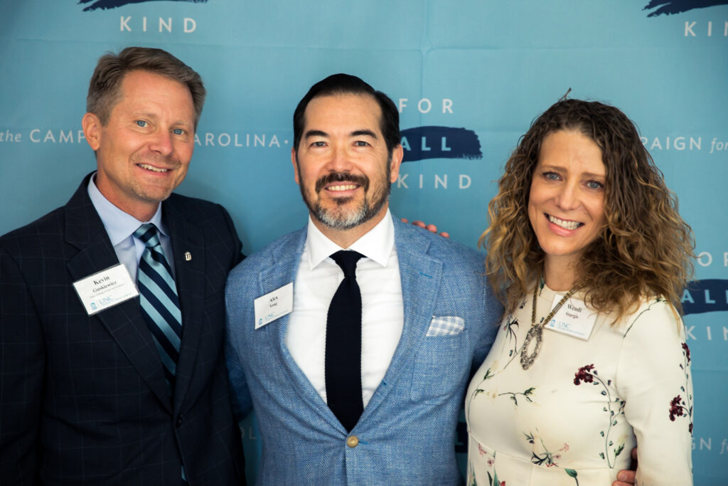 Chancellor Kevin Guskiewicz, then dean of the College (left), celebrated Alex Yong and Wendi Sturgis’ gift at Carolina’s campaign kickoff in October 2018. The couple’s support benefits scholarships, the Writing and Learning Center and diversity initiatives in the department of computer science. (photo by Jafar Fallahi)