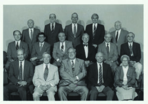 Vic Briscoe (second row, far right) is pictured with a group of low temperature physics scholars he met at various academic conferences.